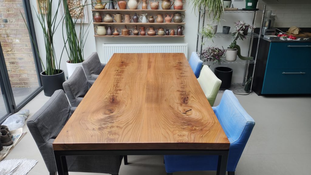Table top with square edges using book matched pair of Elm planks