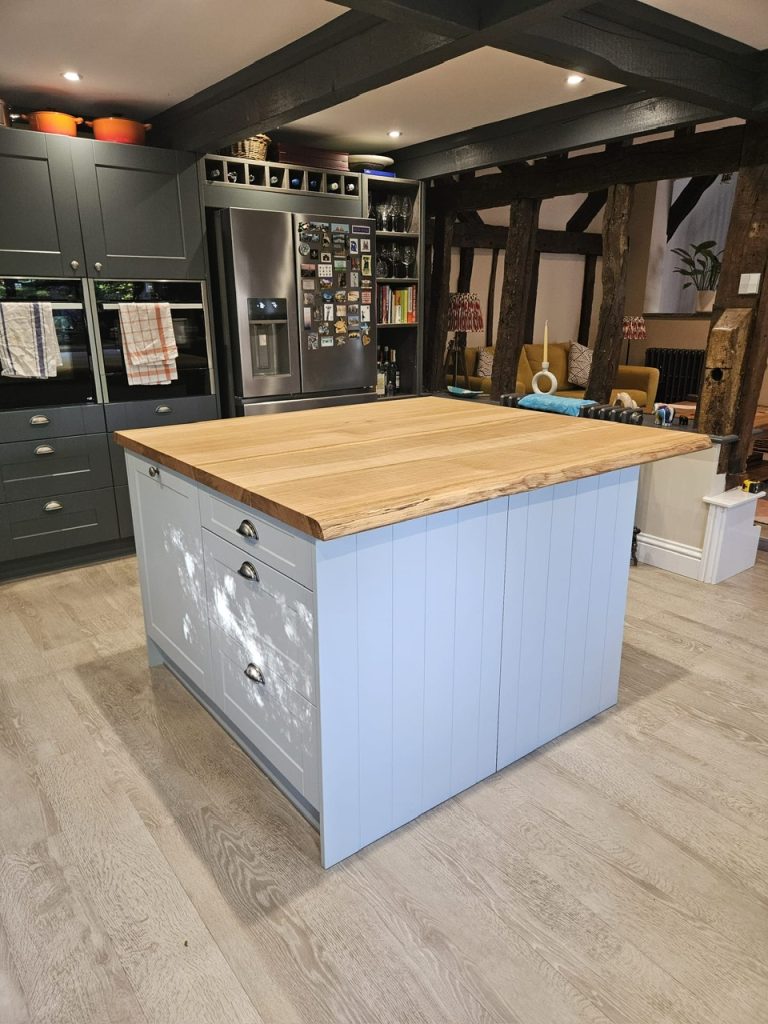 Oak kitchen island made out of 4 large Oak slabs. Joined, sanded and oiled in Osmo oil. Measuring 1400 x 1300 x 44mm thick.