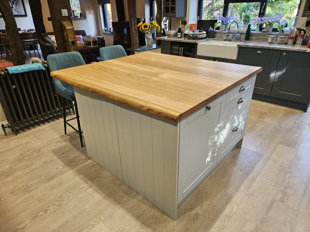 Oak kitchen island made out of 4 large Oak slabs. Joined, sanded and oiled in Osmo oil. Measuring 1400 x 1300 x 44mm thick.