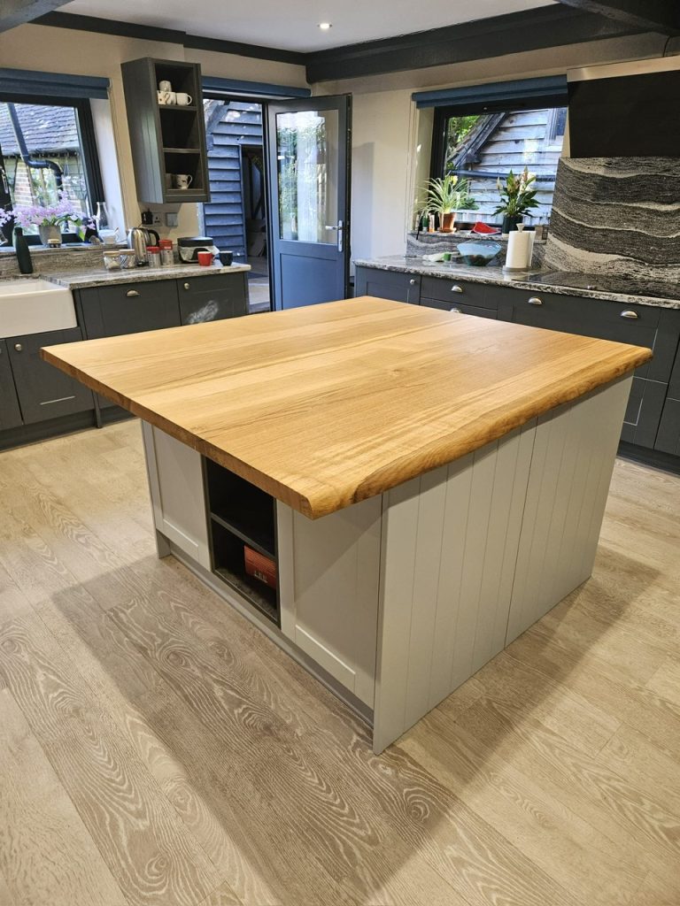 Oak kitchen island made out of 4 large Oak slabs. Joined, sanded and oiled in Osmo oil. Measuring 1400 x 1300 x 44mm thick.