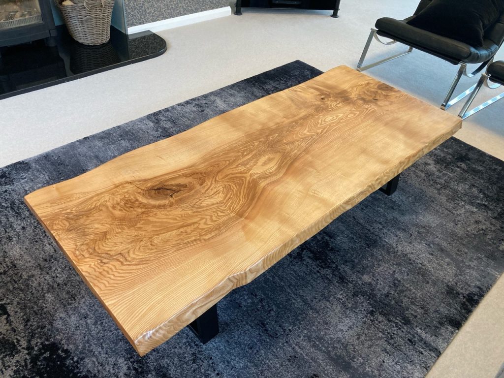 So pleased with the finished job ! Trapezium legs are from Stoaked - really well made and solid to fix to top . Thank you for the well shaped and sanded timber , all cut to perfect size for us . Real character in the wood - oil is one coat of osmo clear extra thin for penetration and then two coats of osmo 3011 clear glossy . Thanks again Cheers Steve