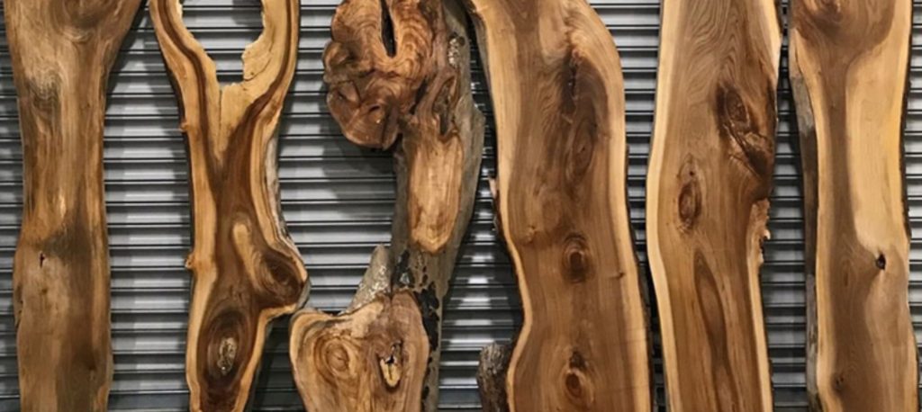 Image of timber stacked up against one another